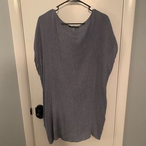 Light blue short dress with pockets.